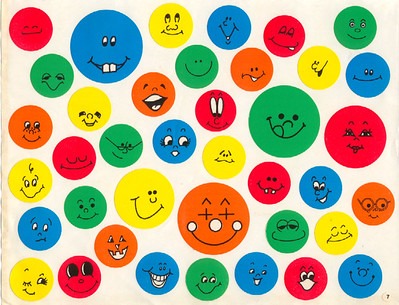 Colorful circles with various hand-drawn smiley faces in different expressions are scattered on a white background. The circles are blue, green, red, yellow, and orange.
