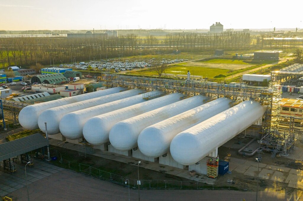 These giant white tanks hold liquified CO2 that